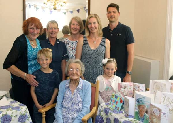 Family gather round Rose Jones at her 100th birthday celebrations dm151970a