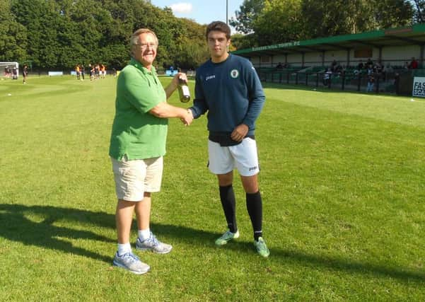 Lee Hardings fantastic strike versus Farnborough saw him win the Football Collectables August goal of the Month voted for by the Clubs supporters. He is seen being presented with a bottle of bubbly provided by Tesco in Burgess Hill by long-time supporter Jonathan Harvey before the Dulwich match.