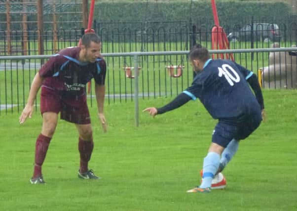 Action from Little Common's 4-2 win at home to Ringmer on Bank Holiday Monday. Picture by Simon Newstead (SUS-150831-144508002)