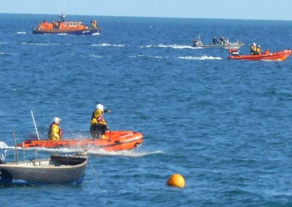 The rescue teams searching for the missing man on September 6. Picture by Max Gilligan