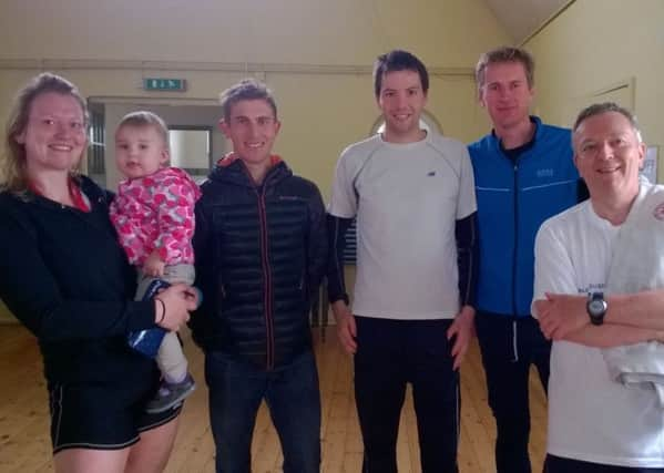 John Faulds Hellingly 10k: Harriers Natalie (and Lara) Chivers, Russ Mullen, Robs Watts and Mark Sykes with race winner Paul Navesey.