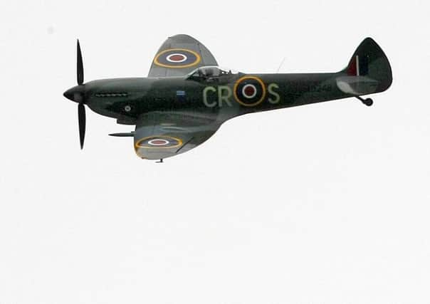 DM15114136a.jpg Goodwood Revival 2015. Battle of Britain air display. Photo by Derek Martin SUS-150913-205740008