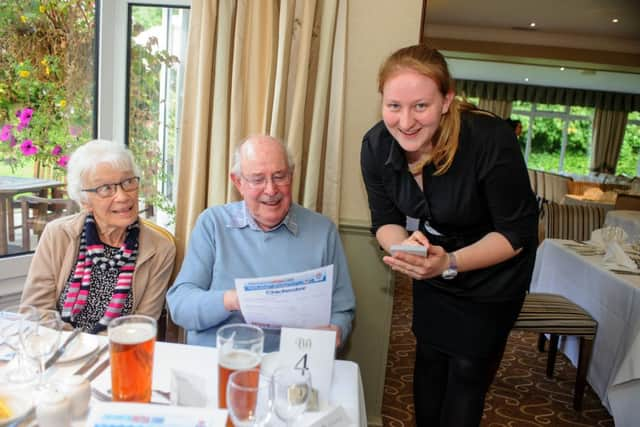 Marilyn Wheeler and her husband Derek Wheeler are asked for their order by student Anna Lewis. 

Picture: Allan Hutchings