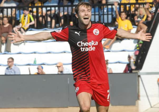 Gwion Edwards scores Crawley's third goal against Cambridge Utd (Pic by Jon Rigby) SUS-150822-203614008