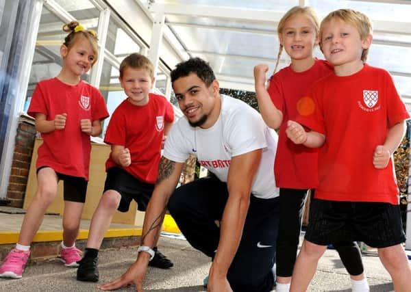 World Championship Silver medal winner Luke Lennon-Ford visited Nyewood C Of E Infant School in Bognor as part of Sports for Schools Inspirational visits with GB athletes. Pic Steve Robards SR1523667 SUS-150810-150125001