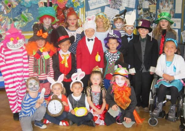 Netherfield Church of England Primary School celebrating the 150th anniversary of Lewis Carroll's Alice in Wonderland. SUS-151013-141451001