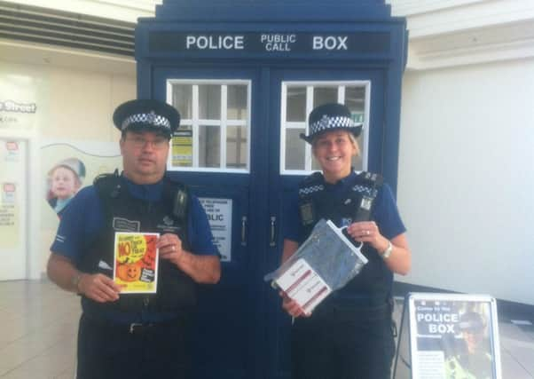 Police in Swan Walk shopping centre, Horsham