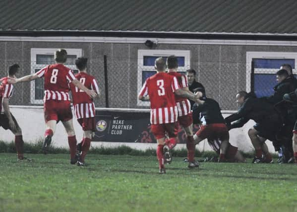 Steyning FC V Horsham FC in the FA Vase - Steyning score in the dying minutes of Extra time to secure a memorable victory against Horsham (Pic by Jon Rigby) SUS-150211-095340008