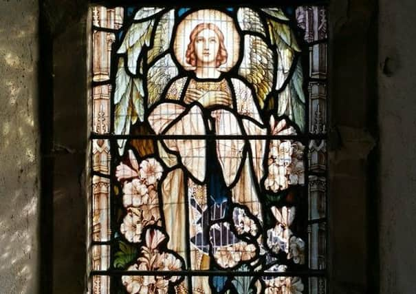 St George's Church's smashed window. Photo courtesy of Sussex Police