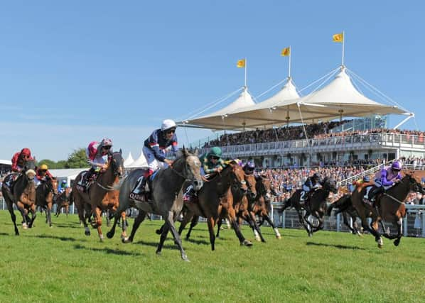 Frankie Dettori on his way to winning the Qatar Stewards' Cup on Magical Memory / Picture by Malcolm Wells