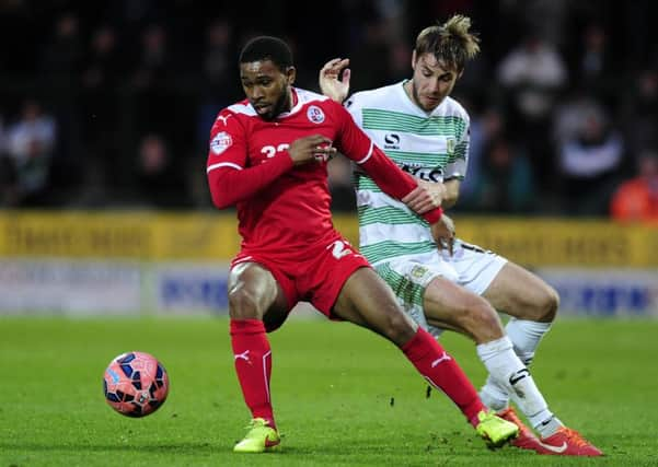 Crawley Town's Gavin Tomlin is tackled by Yeovil Town's Sam Foley PHOTO: - Mandatory by-line: Harry Trump/Pinnacle - Photo Agency Ltd Tel: +44(0)1363 881025 - Mobile:0797 1270 681 - VAT Reg No: 183700120 - 08/11/2014 - FOOTBALL - The FA Cup First Round - Yeovil Town v Crawley Town - Huish Park, Yeovil, Somerset, England. SUS-140911-140220002