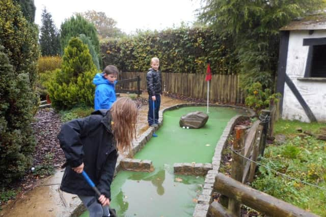 Crazy golf in the rain