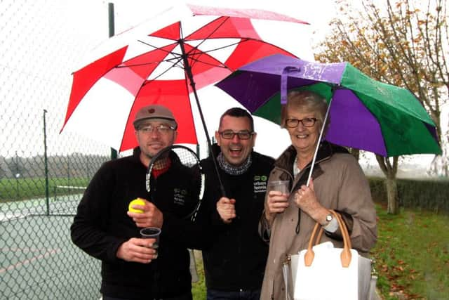 Dan Elson, Simon Trott and LTA President Cathie Sabin. Picture by Ron Hill