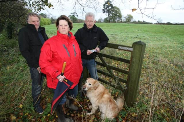 DM15227064a.jpg Residents up in arms over planning application for 400 new homes at Fontwell. L to R John Cann, Sue Wallsgrove and Kevin Trust. Photo by Derek Martin SUS-151117-174747008