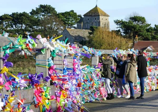 Friends of Shoreham air crash victim Matt Jones secure tributes to the Old Shoreham Tollbridge. PRESS ASSOCIATION photo. Gareth Fuller/PA Wire