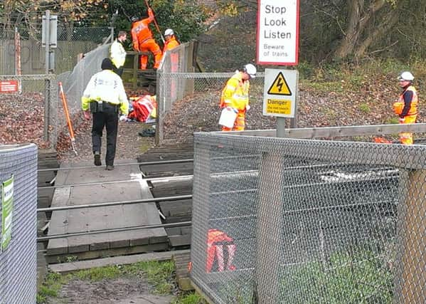 Emergency services at the scene after the body had been removed.