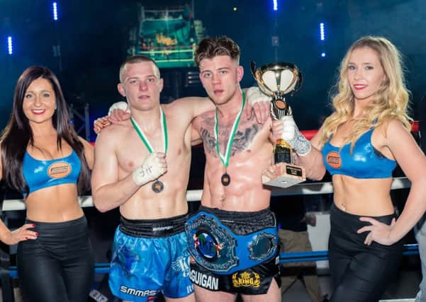 Jamie McGuigan with his trophy and belt after triumphing at Sussex Coast College Hastings. Picture courtesy Jon Snapaway