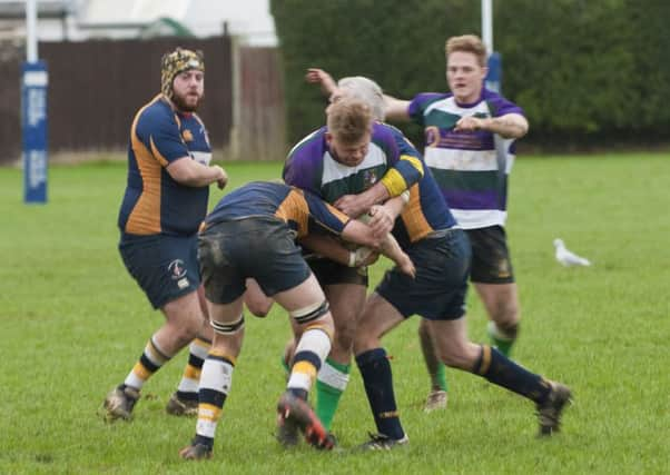 Mark Ubsdell carries hard for Bognor / Picture by Tommy McMillan