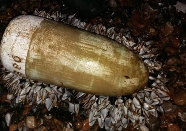 Sally Baker took this picture of the unexploded bomb on East Worthing beach this morning. SUS-151216-092031001