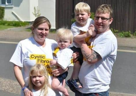 Joanne and Neil with children Imogen, Archie and Zachary