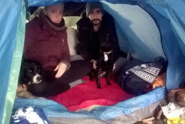 Jan and Jessica in the tent they have lived in near Chichester for five months