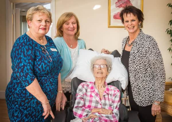 From left to right: Home Manager Athena Stevens, Home Administrator Claire Pinnells, Knowle Park resident Gene Cook and Anne Milton MP SUS-160120-093808001