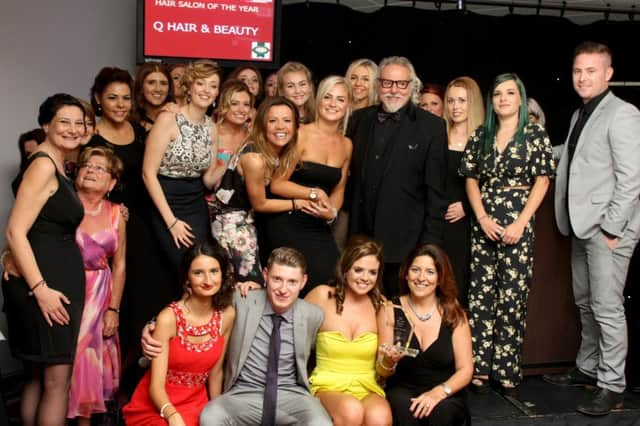 Team from Q Hair & Beauty. Photo by Derek Martin