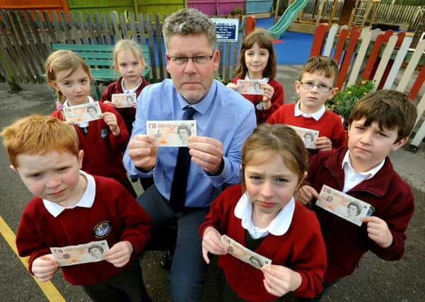 Headteacher Lawrence Caughlin of Swiss Gardens Primary School, Swiss Gardens, Shoreham-by-Sea, has signed a petition calling for fairer education funding (West Sussex has the 4th lowest in the country). The government has offered a pittance to tide them over - the equivalent of Â£10 per child which is less than the cost of a cinema ticket. Pic Steve Robards  SR1601133 SUS-161201-171753001