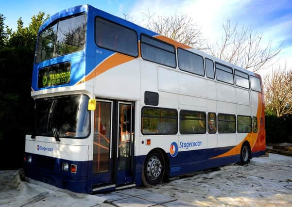 Holmbush Primary Academy now has a bus in the playground which is going to be used as an outdoor classroom/learning environment. Pic Steve Robards   SR1601317 SUS-160113-180529001