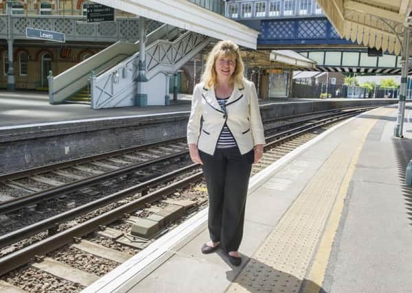 Maria Caulfield at Lewes station SUS-150608-104259001