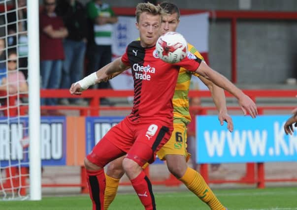 Crawley Town's Lee Barnard in action against Yeovil Town SUS-150921-133302002