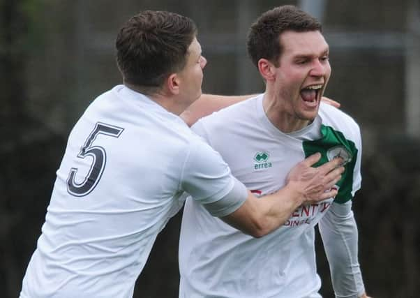 Chichester celebrate their goal at Lancing / Picture by Jon Rigby