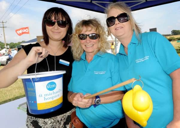 Rye Country Show. St Michael's Hospice L-R Felicity James, Sue Ford and Sally Hitchman. SUS-150815-130753001