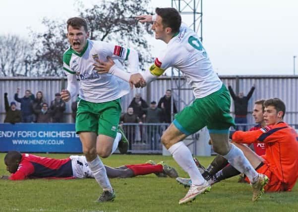 Alfie Rutherford and Jason Prior celebrate Rutherford's winner over Hampton / Picture by Tim Hale