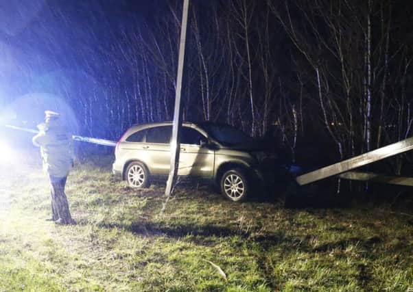 Car collides with lamppost on A24