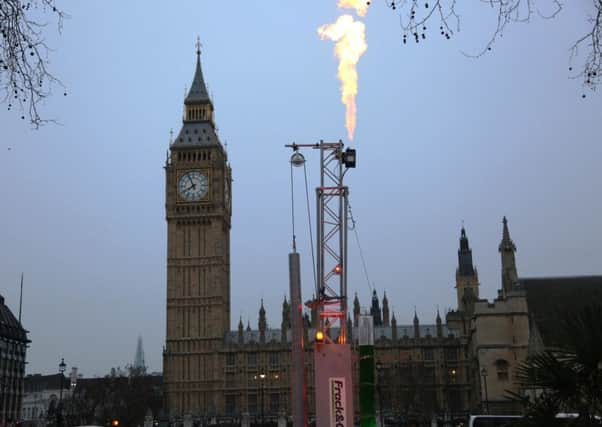 Greenpeace bring the local impacts of fracking to the heart of democracy. Copyright: Kristian Buus / Greenpeace