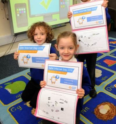 Our Lady Queen of Heaven held an eSafety Day to help the children protect themselves while online. The local community support officer PC Pearce took them through activities. Pic Steve Robards  SR1604126 SUS-160902-160525001