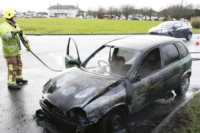 Car fire in Kingston Broadway, near the Holmbush Centre.