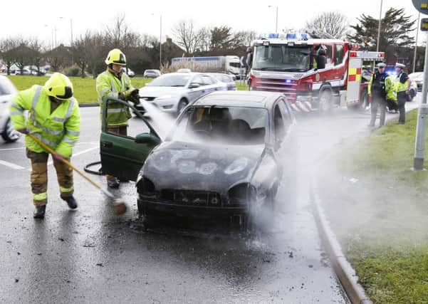 Car fire in Kingston Broadway, near the Holmbush Centre.