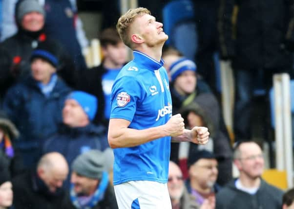 Michael Smith celebrates his goal against Bristol Rovers Picture: Joe Pepler