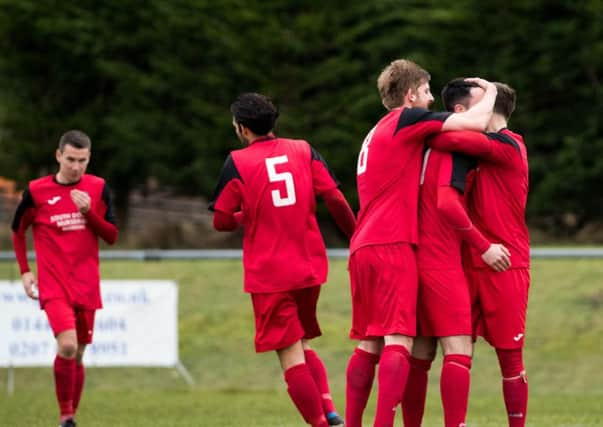 Phil Gault scores the winner against Horsham YM. Picture by Phil Westlake.