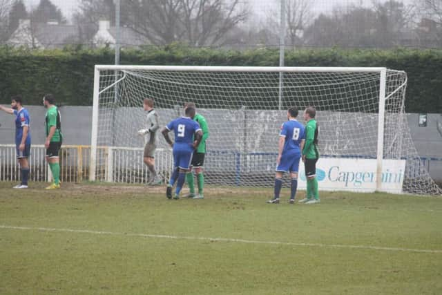 Something amiss with first goal Dan and Andy's arms raised. Picture by Colin Bowman