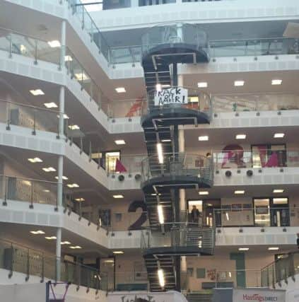 A banner saying 'Frack off Amber' at the Jobs and Apprenticeships Fair at Sussex Coast College Hastings. Photo by @xylottie on Twitter