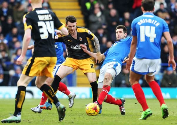 Danny Hollands battles with James Spencer. Picture: Joe Pepler