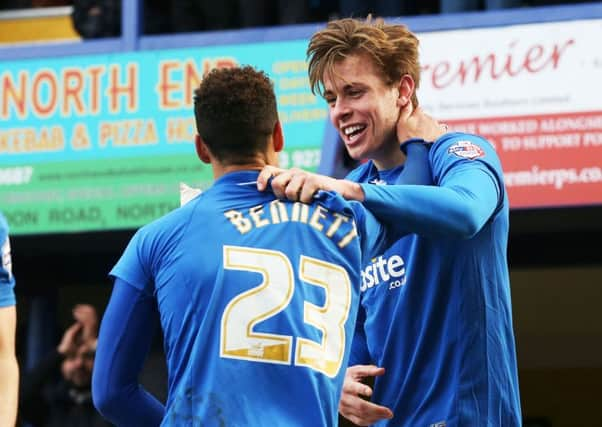 Adam Webster, right, celebrates with Kyle Bennett. Picture: Joe Pepler