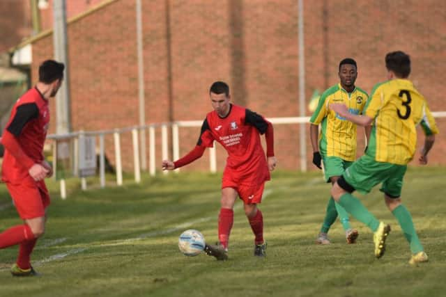 Action from Hailsham Town's 4-4 draw with Hassocks. Picture by Phil Westlake