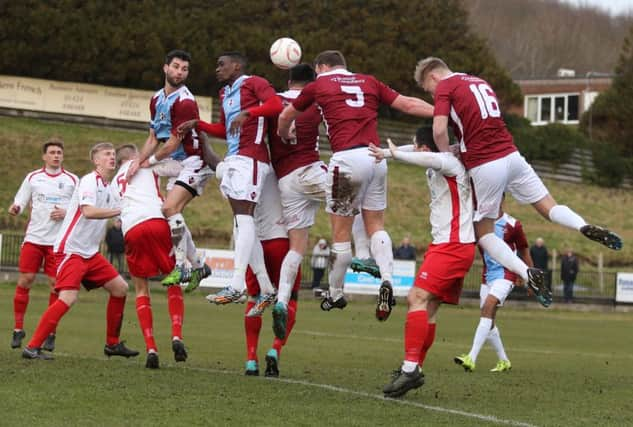 Sean Ray (number five) heads Hastings United's fourth goal in the 6-1 win at home to Whitstable Town on Saturday. Picture courtesy Scott White