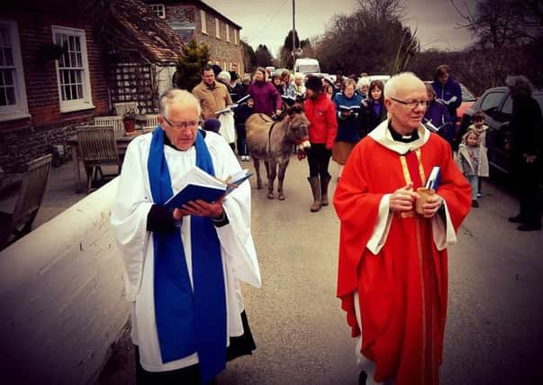 The procession walking down Cot lane ...led by Rev Paul Matthews (vicar) and Colin Ottewell (reader)