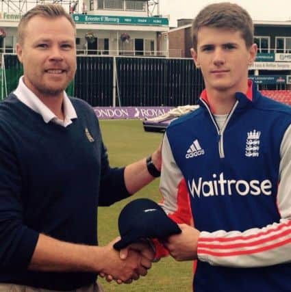 George Garton receives his England cap SUS-160114-122305001