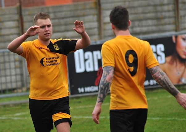 Mitchell Hand celebrates with George Gaskin at Shoreham on Saturday